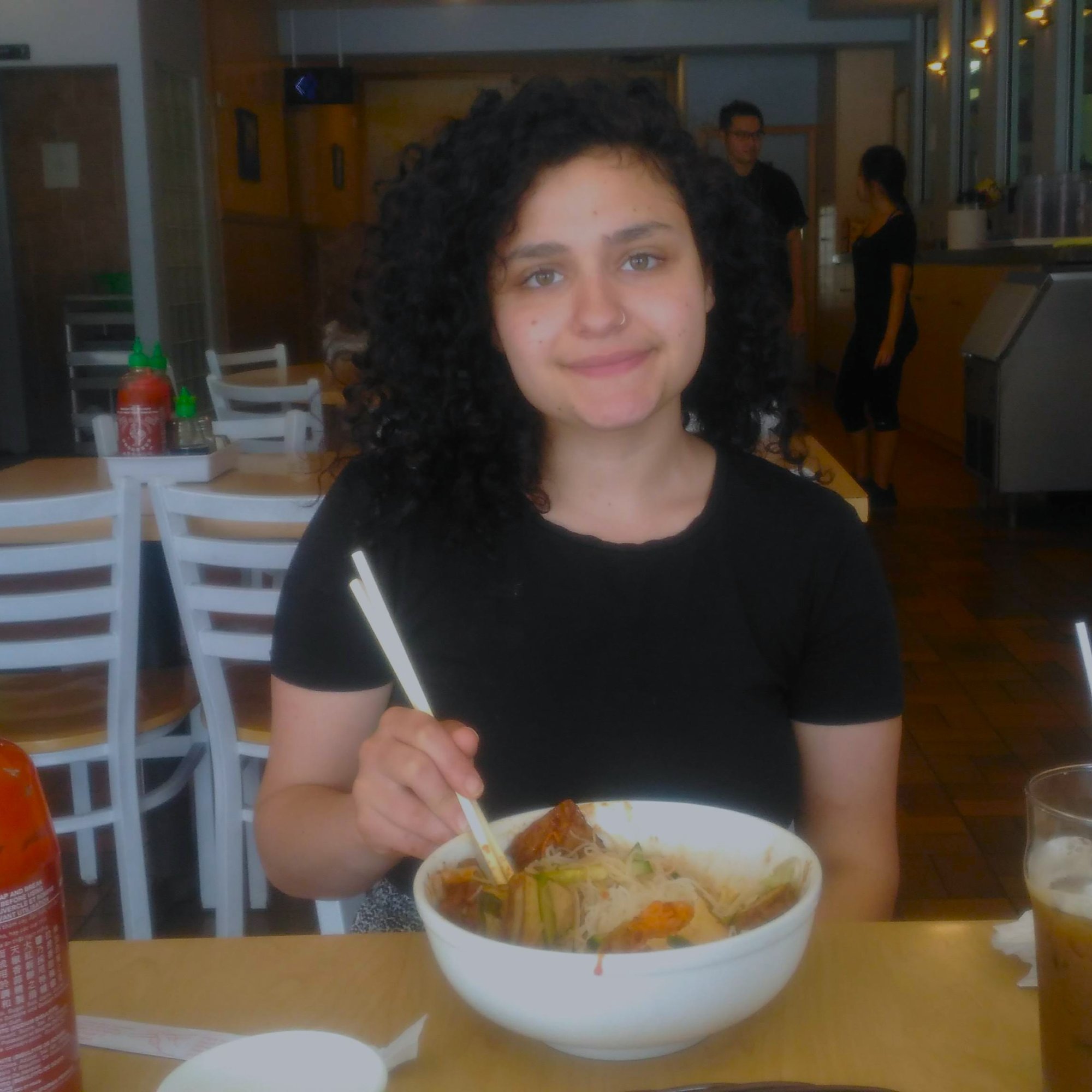 Sarah eating noodles